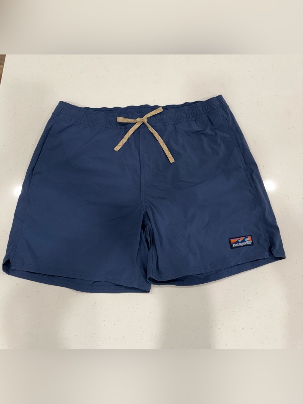 Patagonia Men's Deep Blue shorts with Tan Drawstring